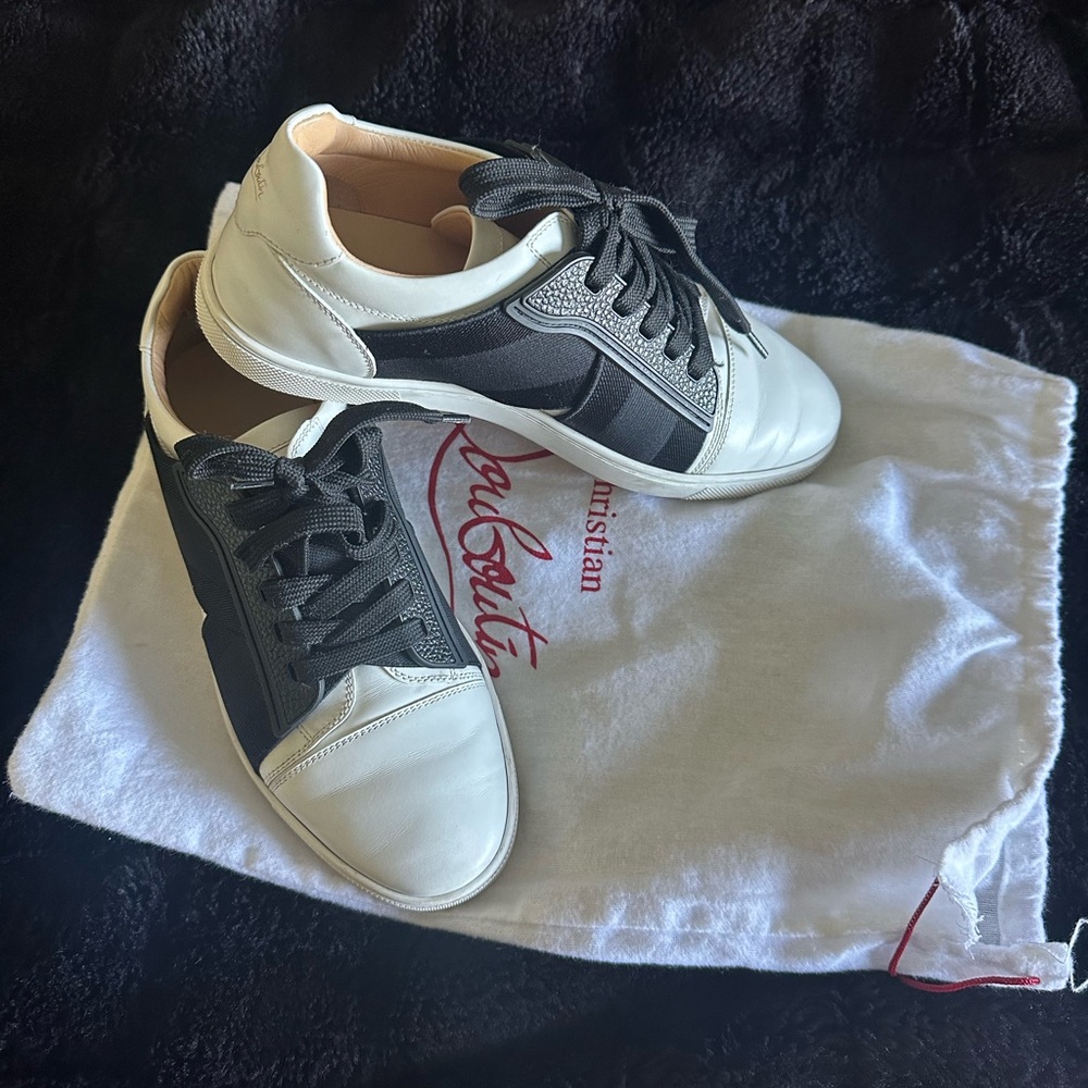 Christian Louboutin white sneaker with black accent